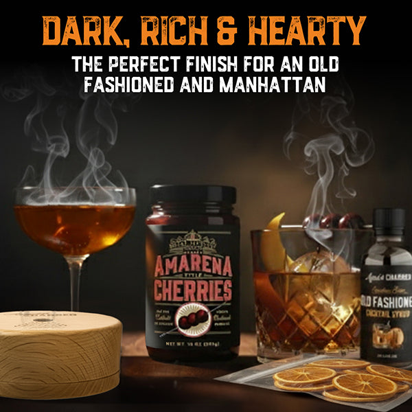 Amarena Cherries bottle with cocktails and smoking glasses on a dark background