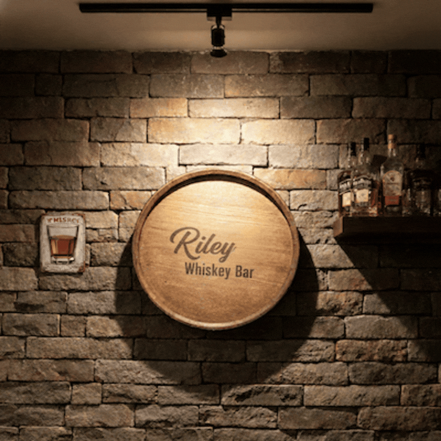 Custom engraved Whiskey display barrel top used as a wall decoration