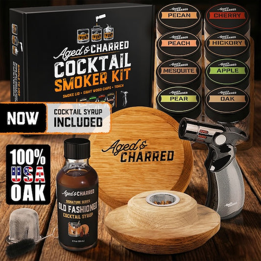 Aged & Charred whiskey smoker lid kit with torch, 8 different types of wood chips, cocktail syrup, and gift box packaging.